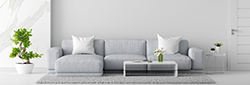 Gray sofa in white living room interior with copy space, 3D rendering